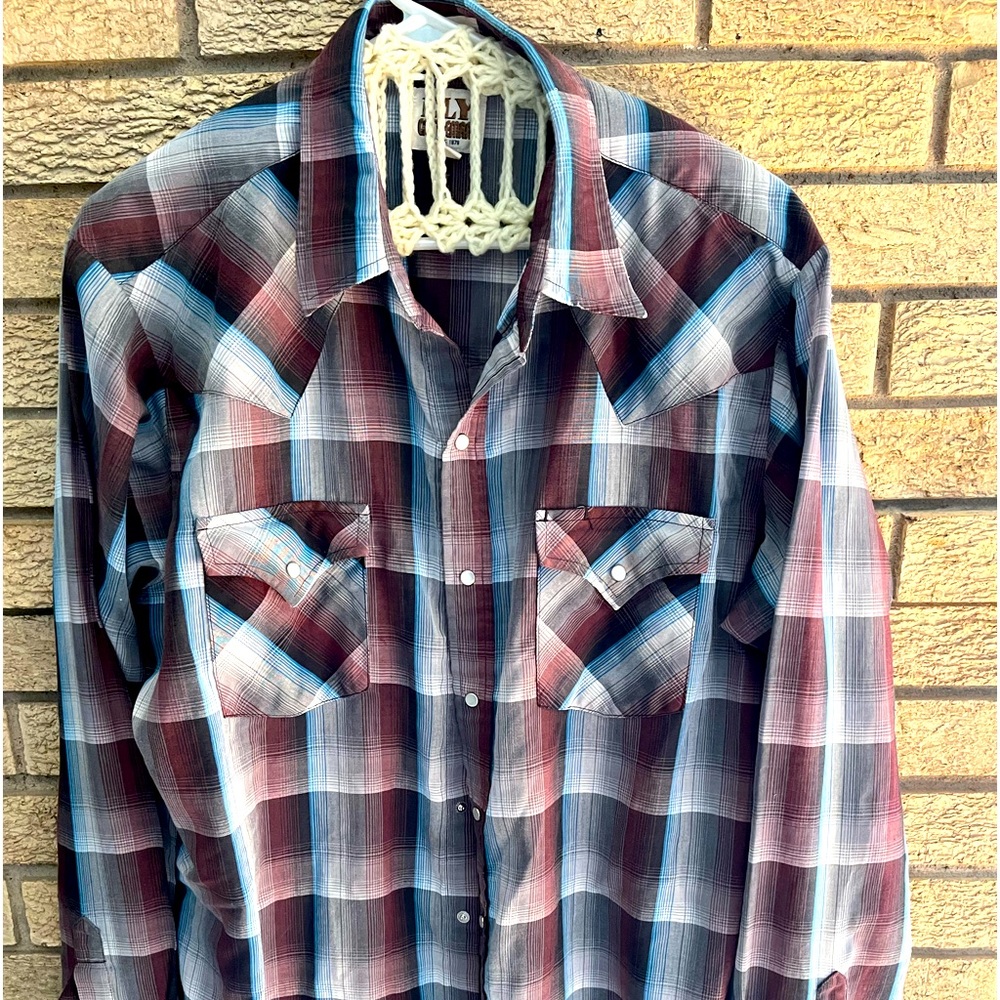 Long sleeve Ely Big and Tall Western plaid Pearl snap shirt.